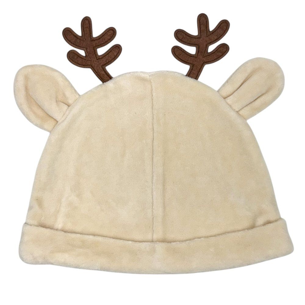 Новорiчна шапочка Next