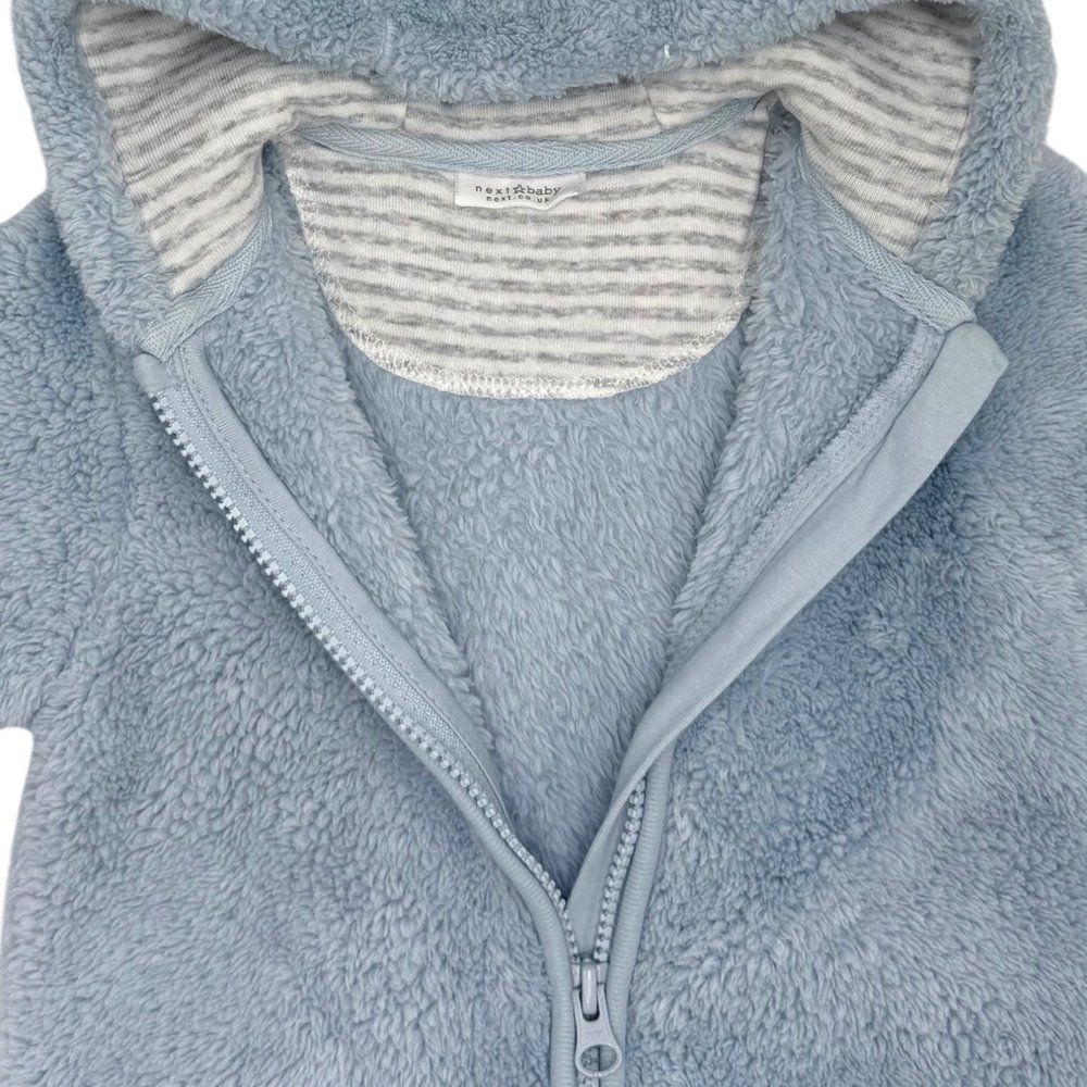 Чоловічок Next